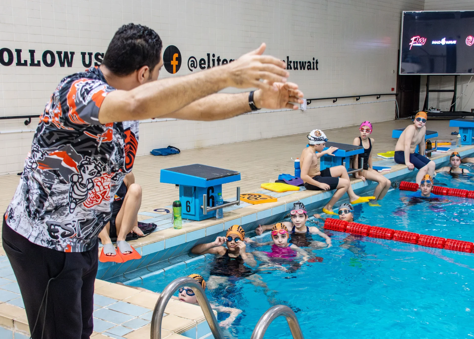 Poolside coaching at every session